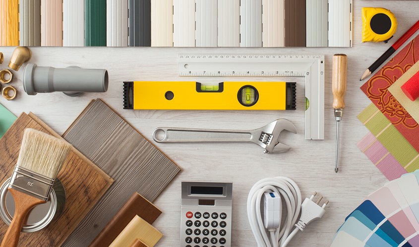 Items related to house improvement arranged on a table top